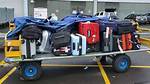 Airport Luggage Trolleys Soaked, Stored Outside in Torrential Rain