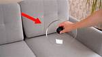 Cleaning Your Couch with a Pot Lid