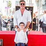 Unveiling Simon Cowell's Son: a Glimpse into His Life and Legacy